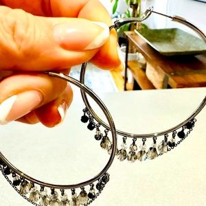 Swarovski hoops with hanging crystals.